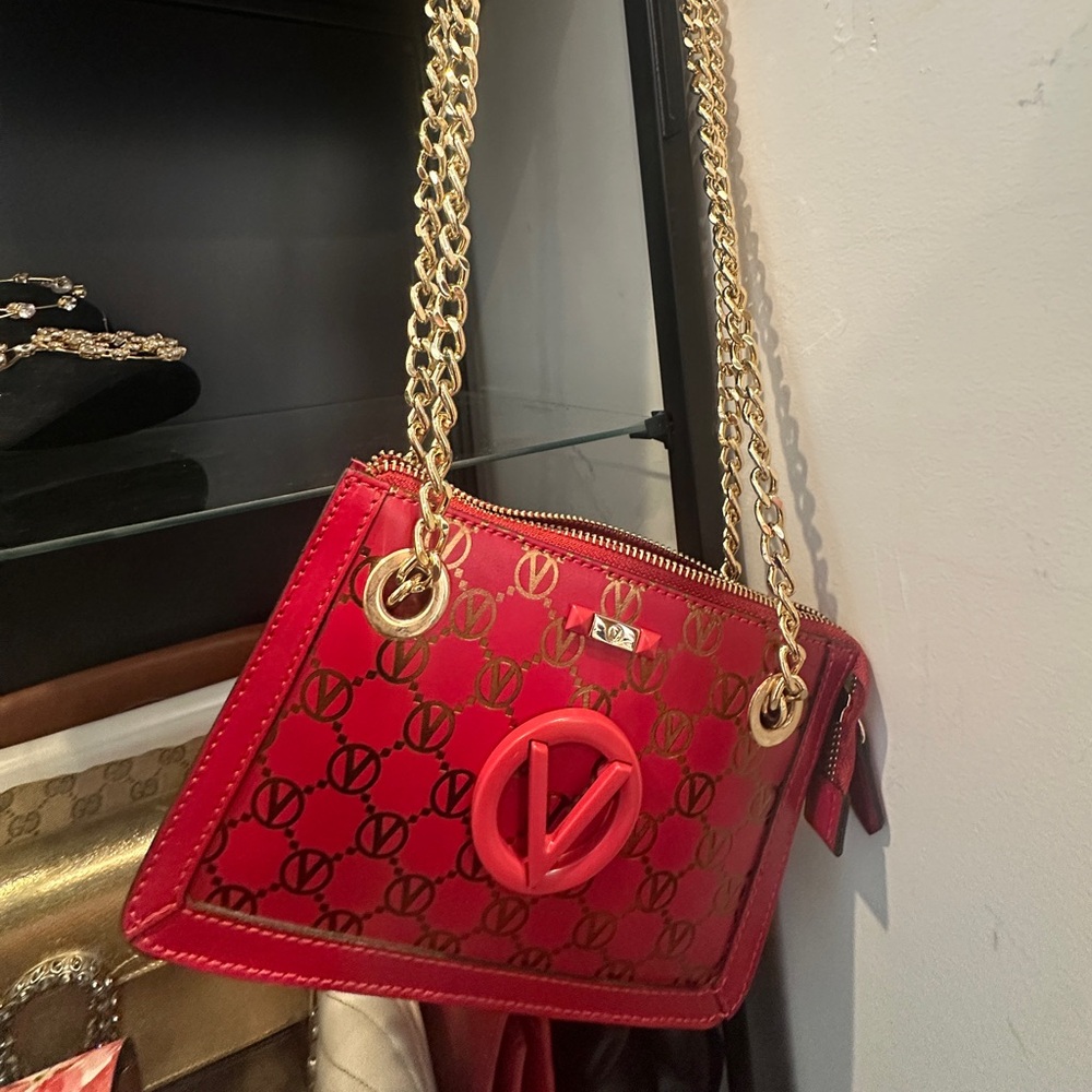 Valentino Luxury Handbag with Gold Accents - Picture 7 of 8